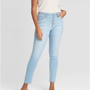 Abela Story & Co. Light Wash Skinny Jeans With Buttons